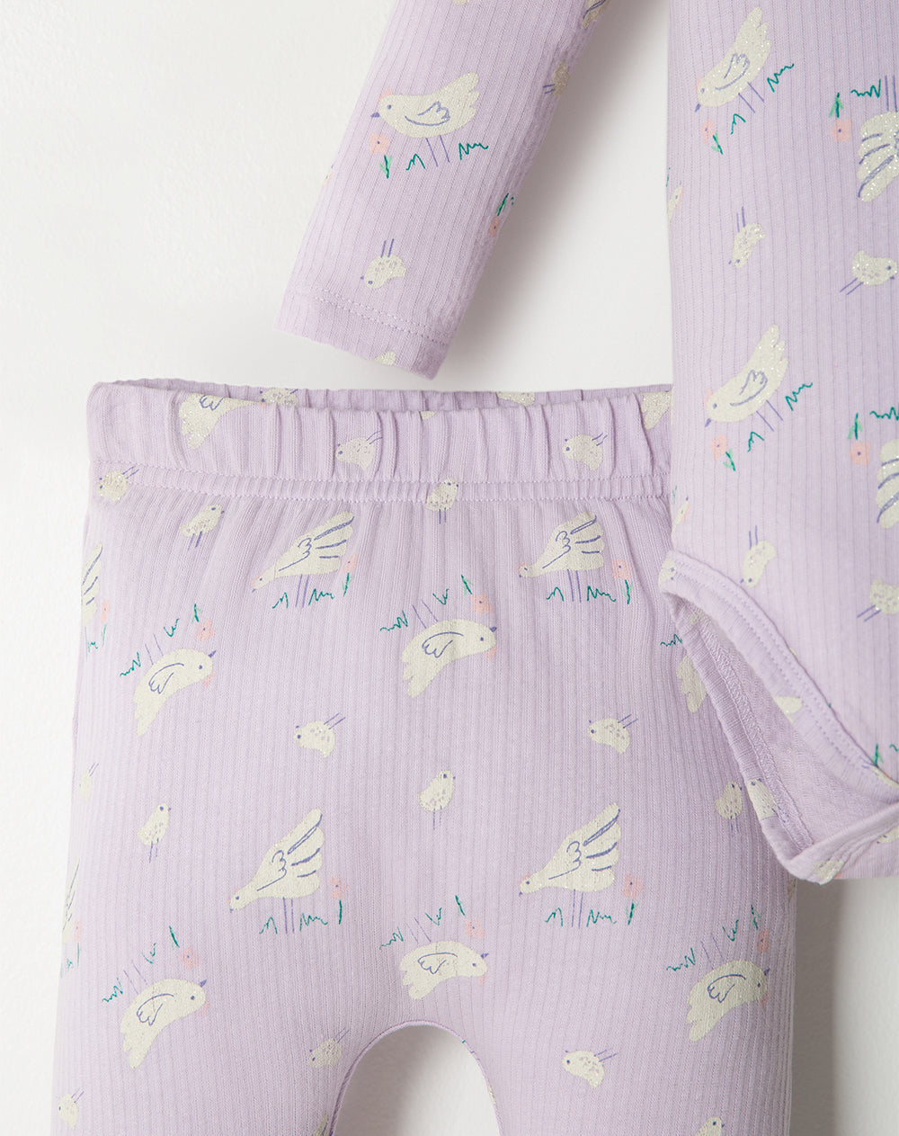 Conjunto bebé niña body + pantalón acanalado lila estampado