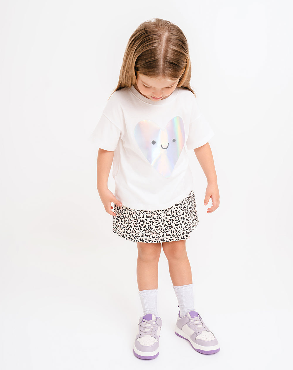 Falda corto tiro alto beige estampado