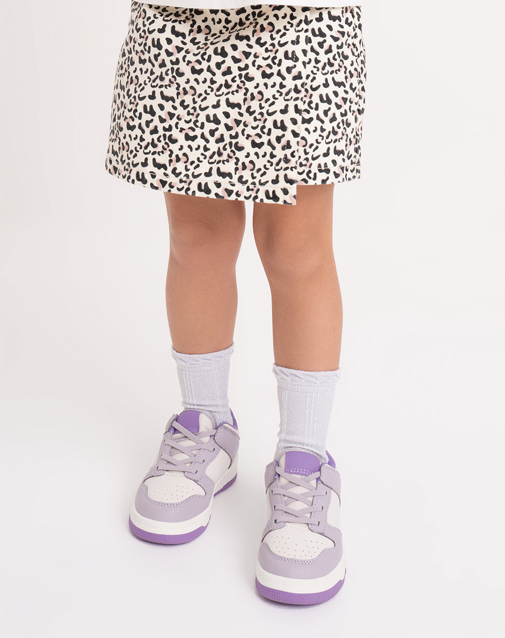 Falda corto tiro alto beige estampado