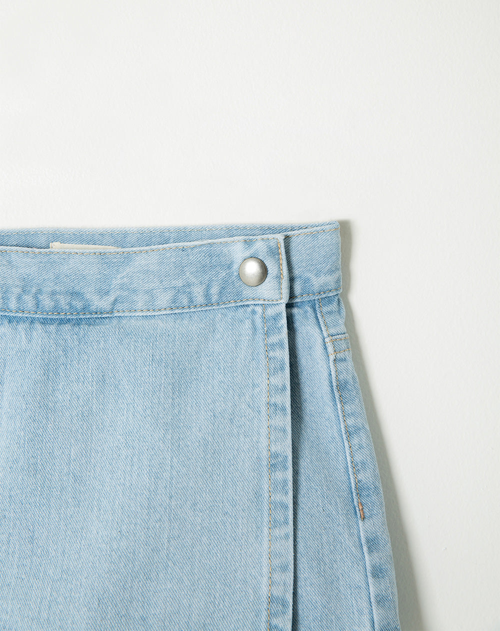 Falda short denim algodón índigo claro niña