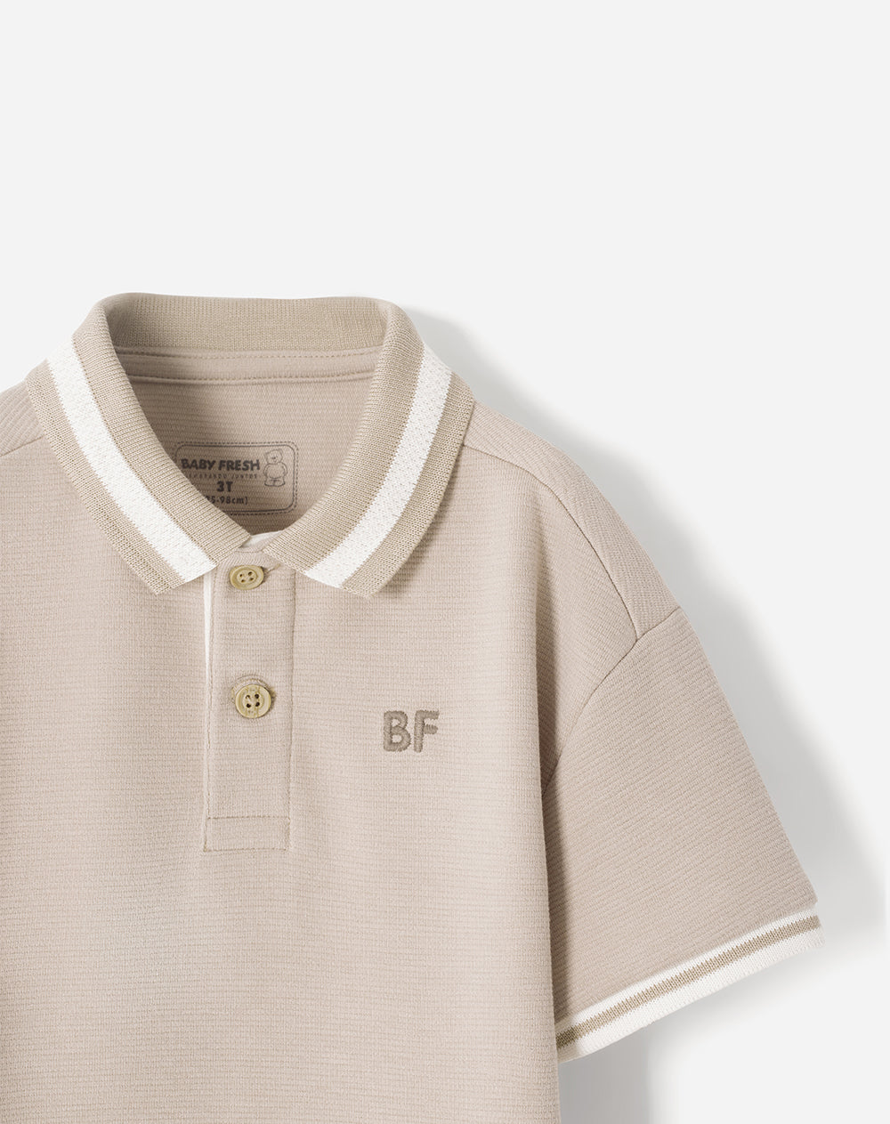 Polo oversize beige niño
