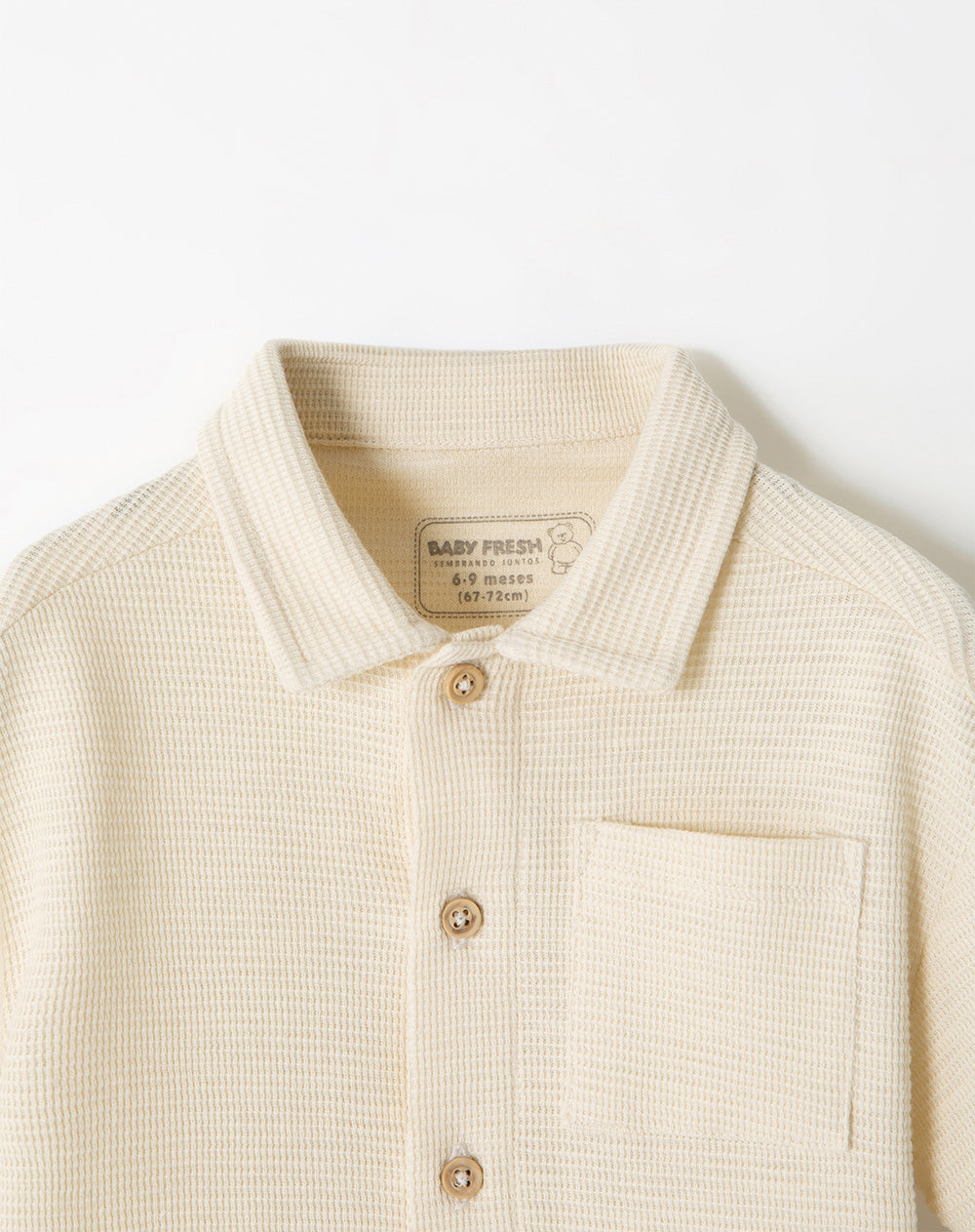 Camisa manga corta textura galleta crema bebé niño