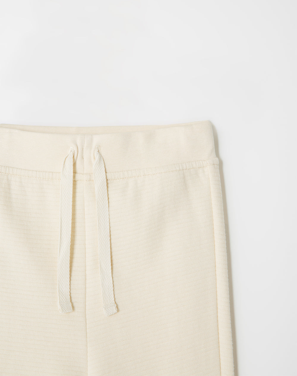Conjunto niño buzo + pantalón algodón crema