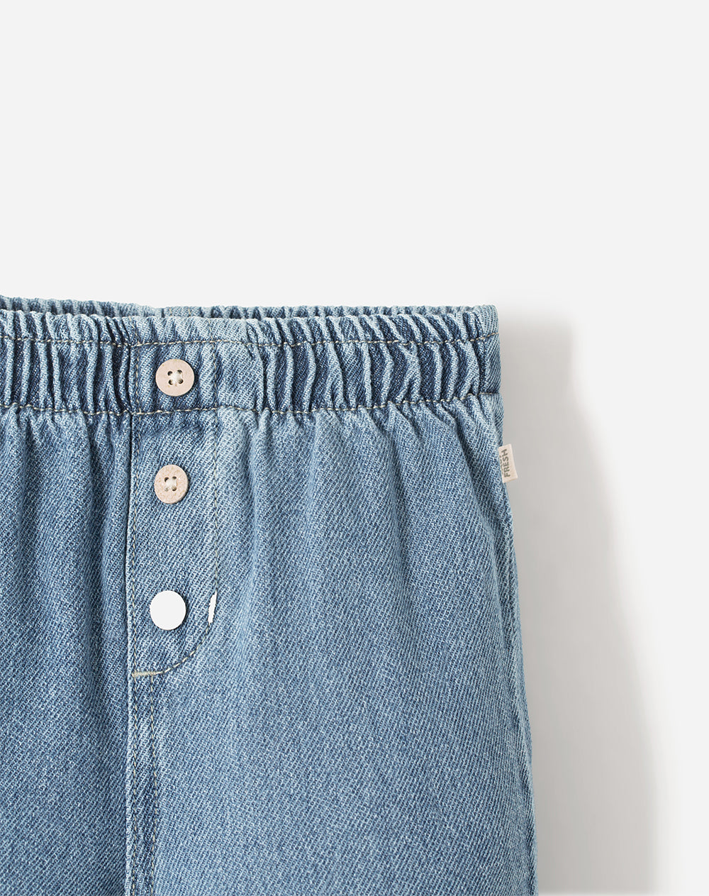 Jean baggy tiro medio algodón indigo bebé unisex