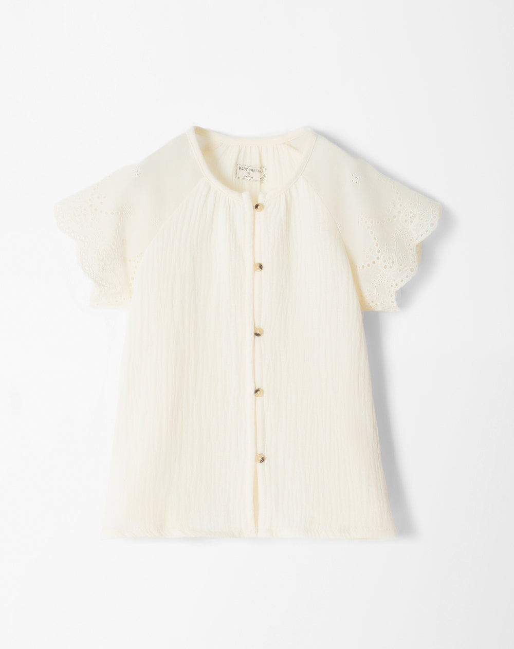 Camisa loose fit manga corta crema