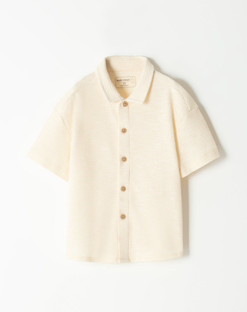 Camisa oversized fit manga corta crema