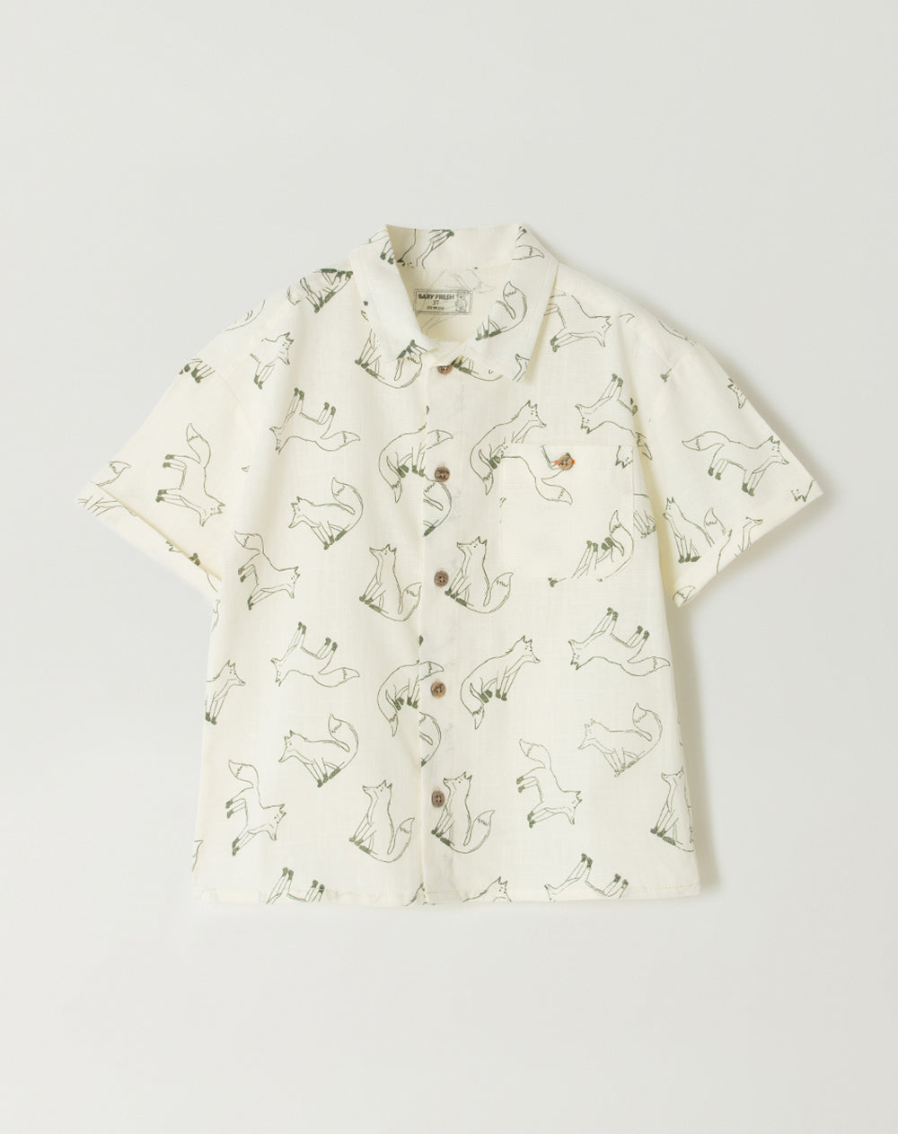 Camisa oversized fit manga corta beige estampada