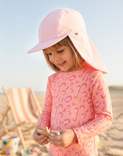 Gorra protectora con cubrenuca rosado niña