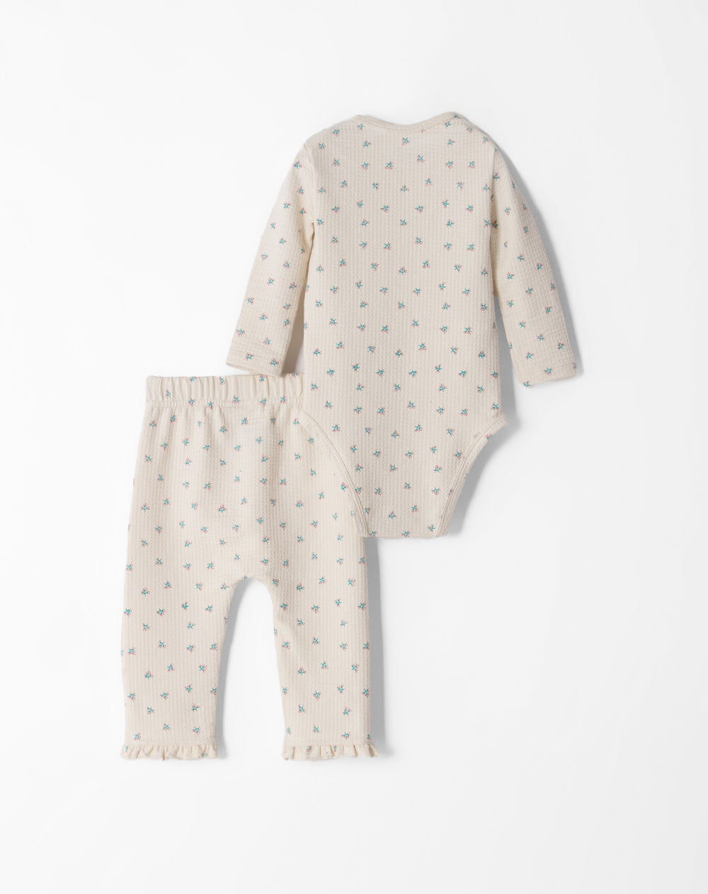 Conjunto pantalon largo manga larga beige estampado