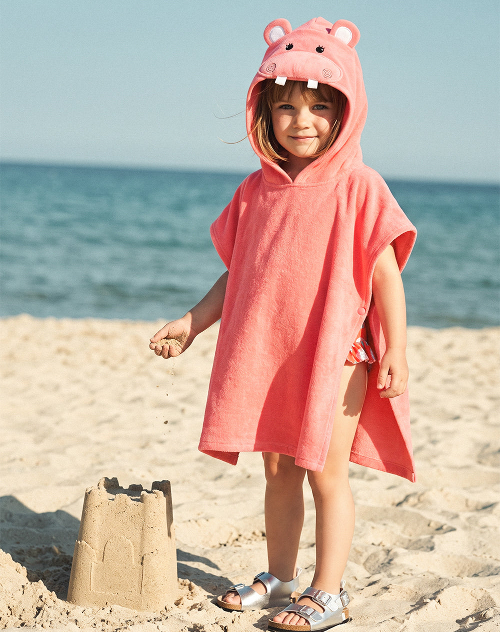 Toalla tipo poncho algodón rosado