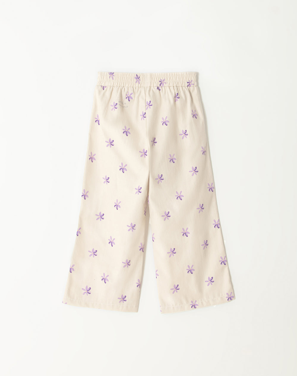 Pantalón loose fit tiro alto crema estampado