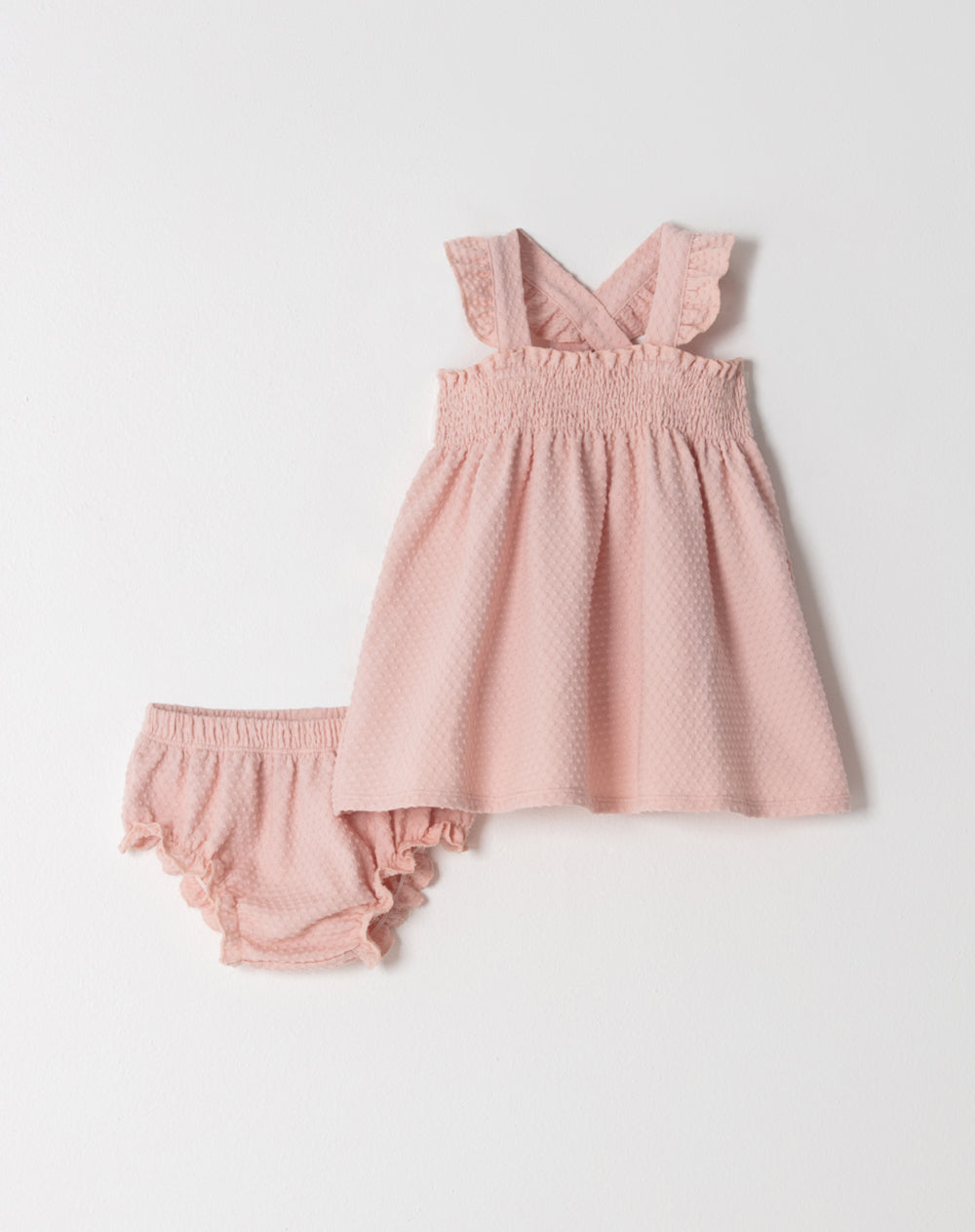 Conjunto vestido + panty en tela con textura rosado