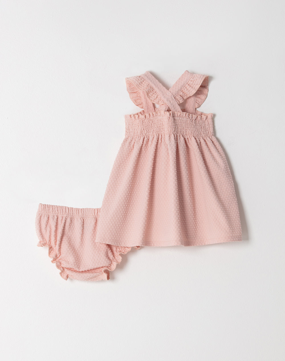 Conjunto vestido + panty en tela con textura rosado