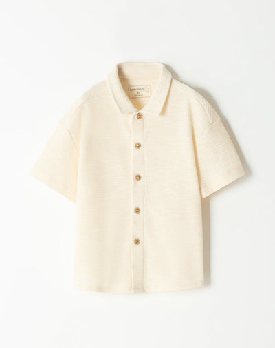 Camisa oversized fit manga corta crema