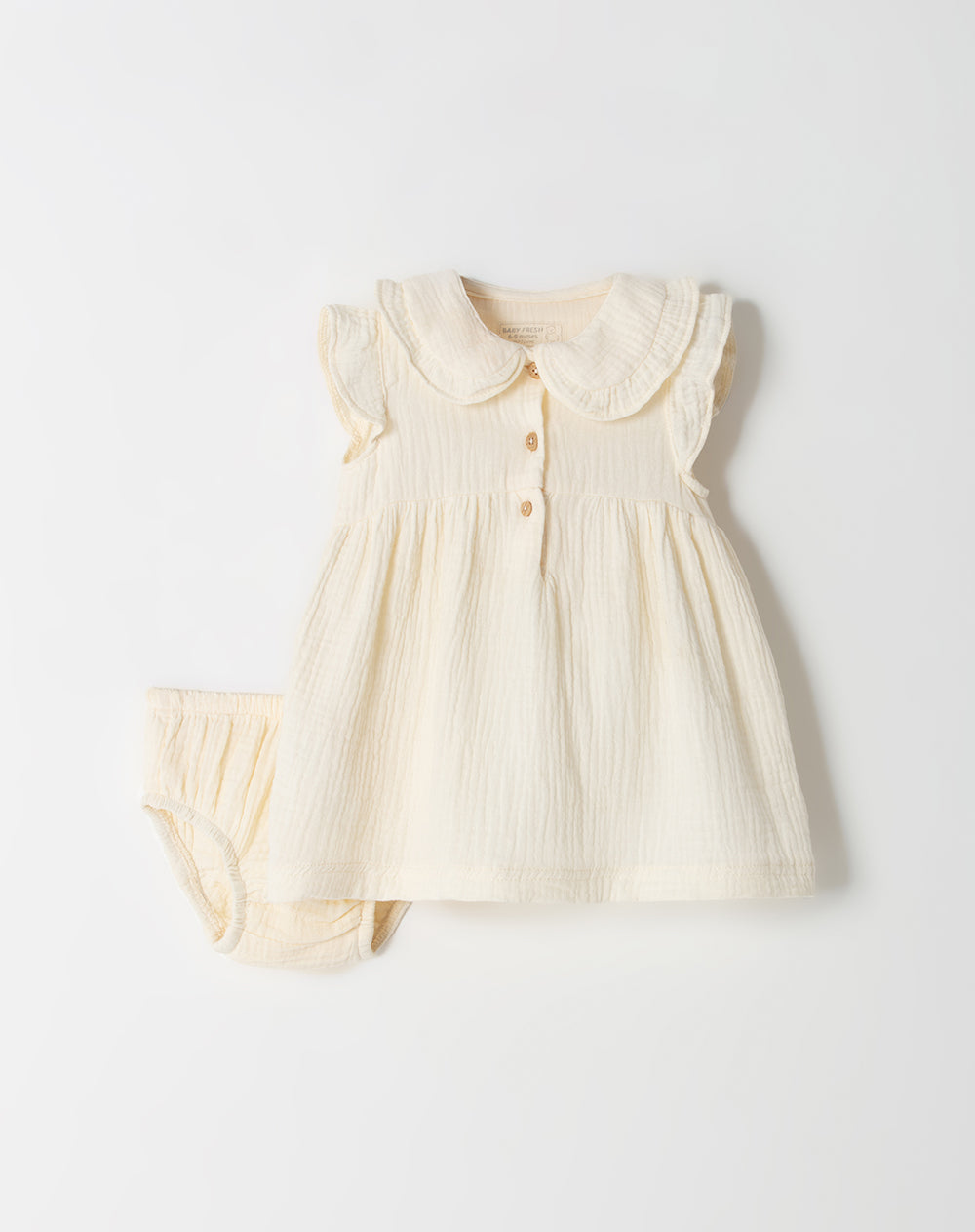Conjunto vestido + panty manga corta crema