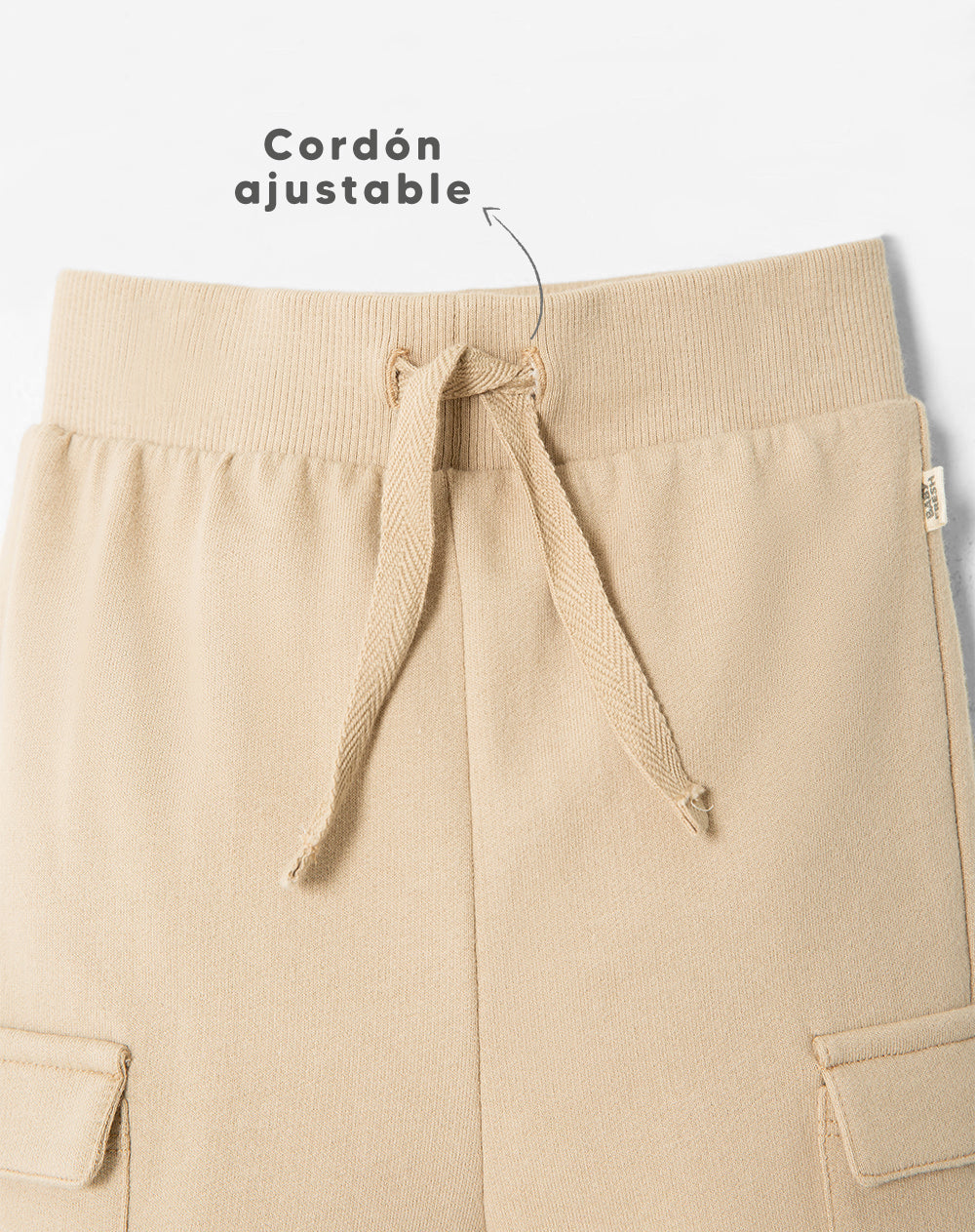 Jogger regular algodón beige niño